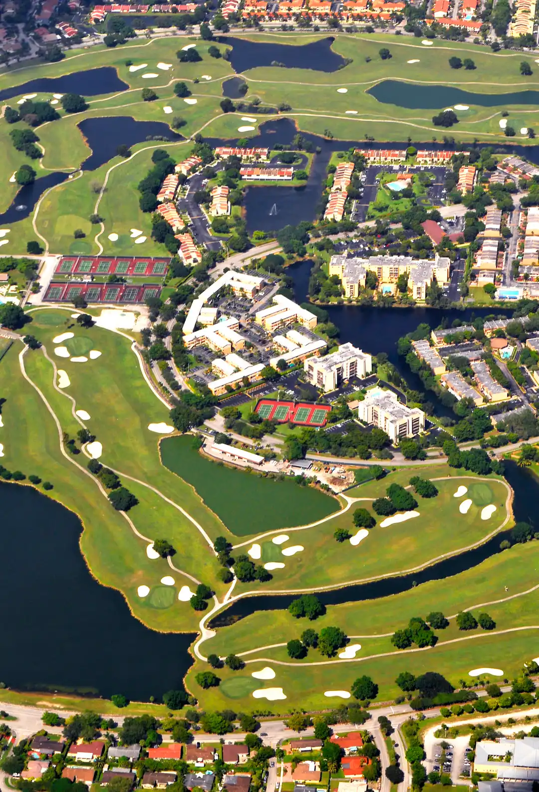 Aerial view of the Miami urban area showing dense development and waterways.