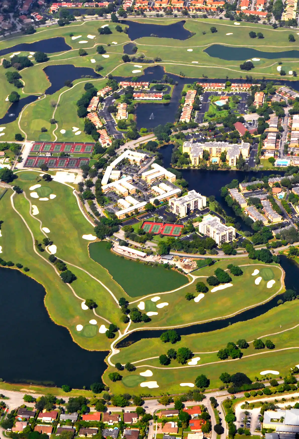 Aerial view of the Miami urban area showing dense development and waterways.