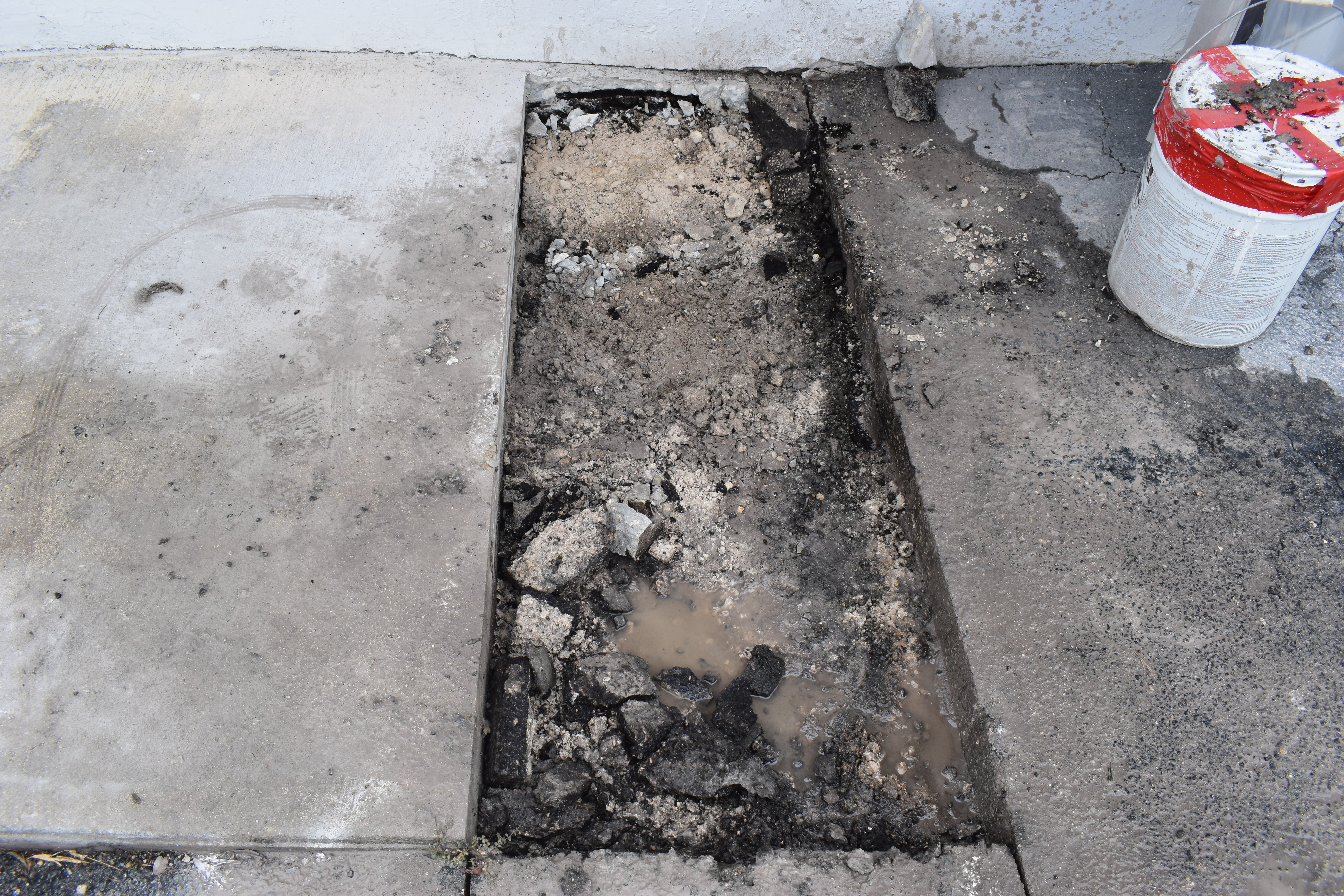 Cast iron pipe damage in commercial building requiring documentation for insurance