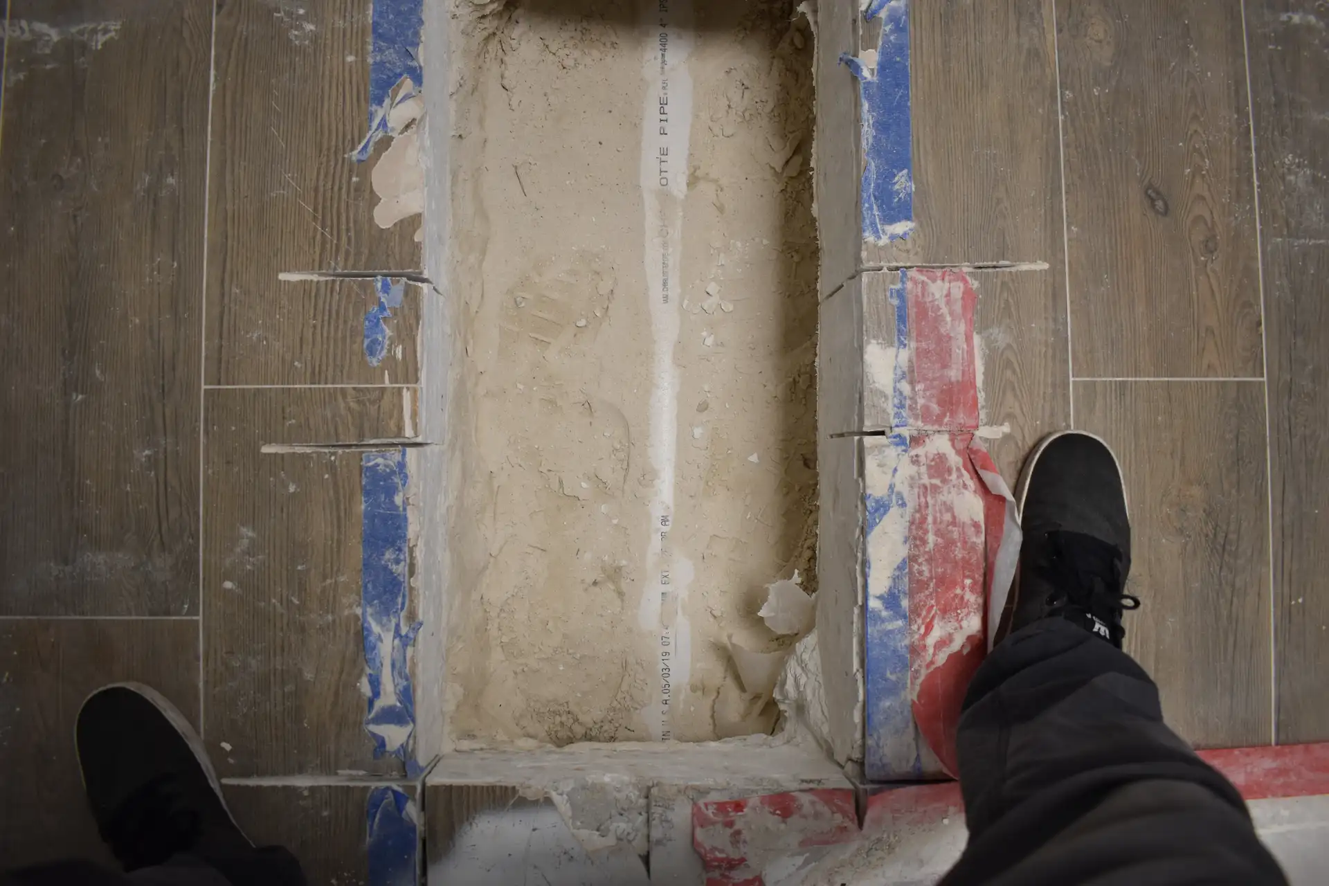 Modern PVC pipes installed to replace old cast iron plumbing