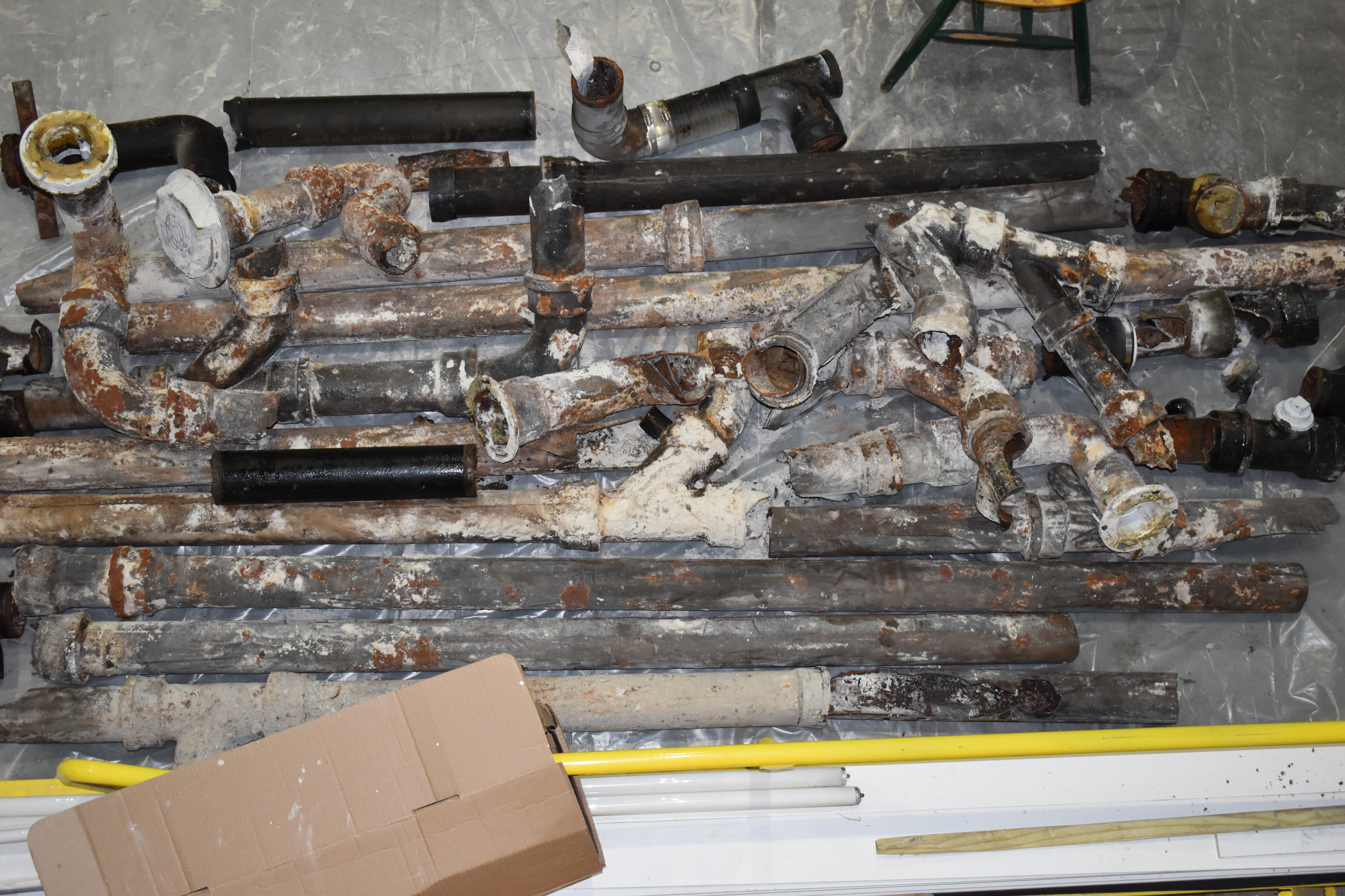 Old cast iron pipes removed during replacement project