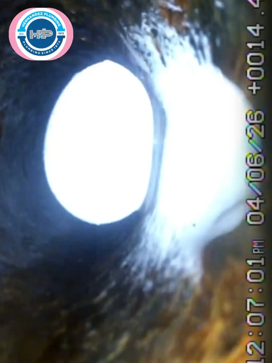 Sewer camera inspection showing a grease blockage in a cast-iron line.